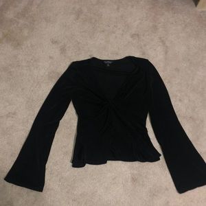 Size US 4 Miss Selfridge black long sleeve with cute knot in the middle.